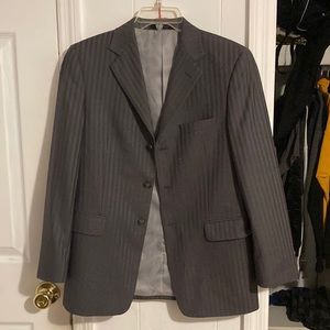 Grey Michael Kors blazer with multiple pockets